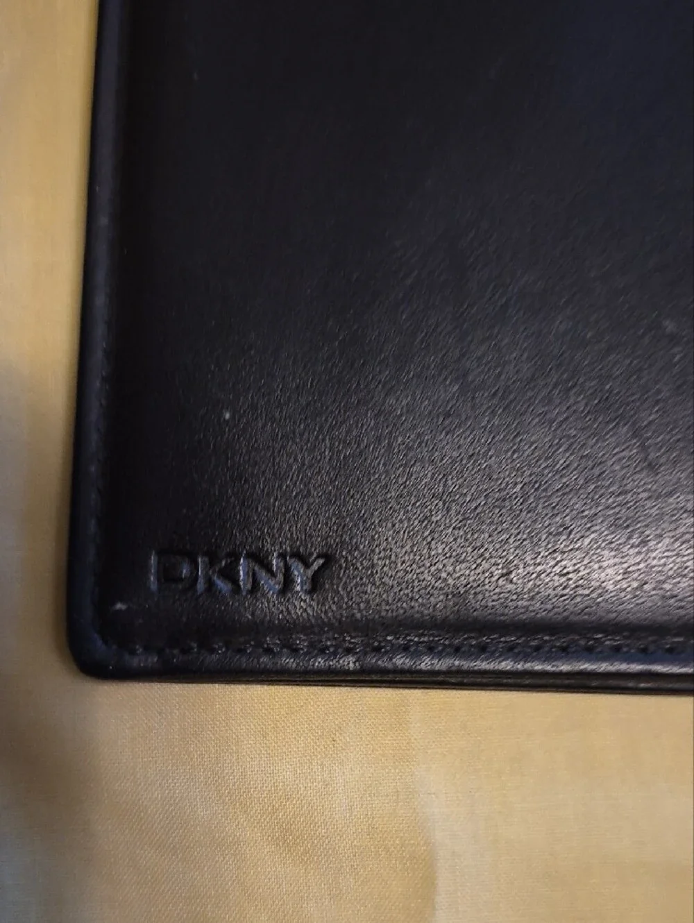DKNY Black Leather Men's Wallet with Subtle Logo